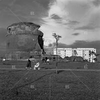 Ruins of mausoleum and modern apartment buildings, Rome, 1960