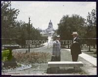 Two men talking near Texas State Capitol