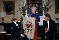 Politics; [Ann Richards and Bill Clinton presenting a flag to President Salinas of Mexico]