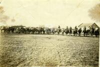 Company D, Texas Rangers with captured tequilla smuggled on horseback