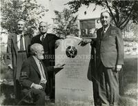 Capt. John R. Hughes kneeling, Ed and Ira Aten standing behinf hughes, Ed Bryant on right