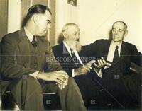 Col. Homer Garrison (left) of Texas Dept. of Public Safety with Texas Rangers Capt. John R. Hughes (center) and Capt. Roy W. Aldrich