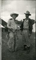 [Two unidentified men]