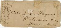 [Envelope enclosing a letter from Governor Edmund J. Davis to John L. Haynes regarding discharges]