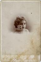 [Card photograph of a young child]