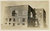 [Photographic postcard of Stamford College after the fire]