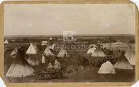 [Photograph of Native American encampment at El Reno, OK]